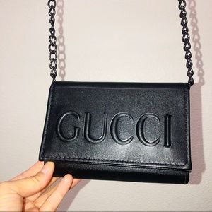 GUCCI embossed chain strap black leather crossbody